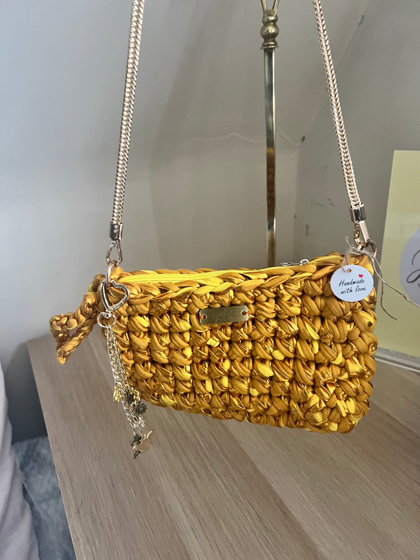 The mini evening clutch in Gold and mustard
